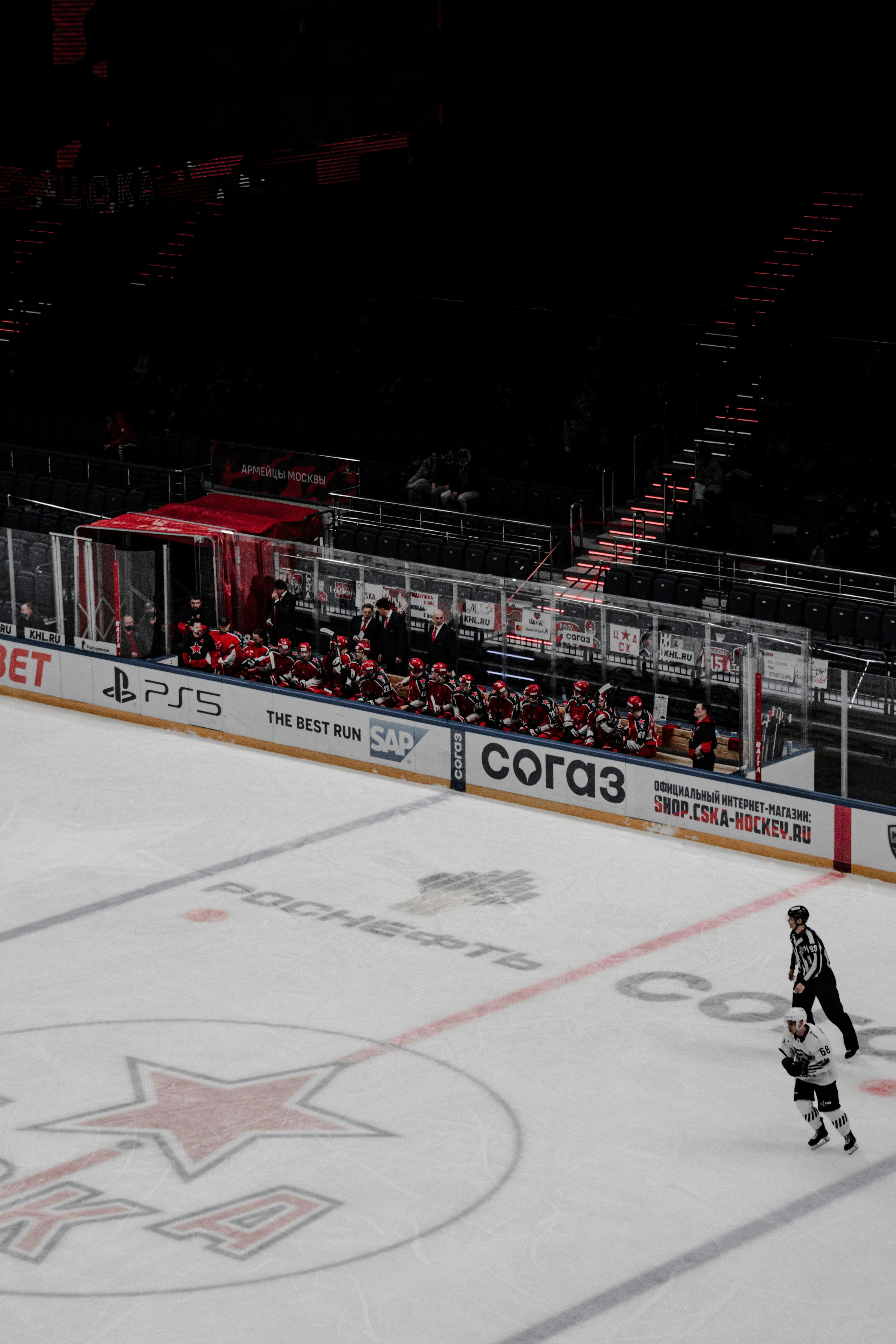 ice hockey players on ice hockey field